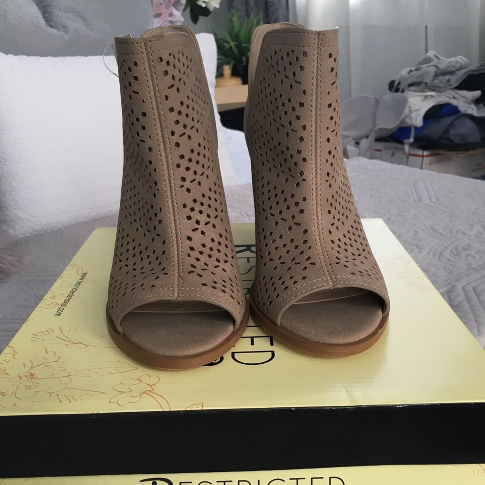 Restricted open toe boots